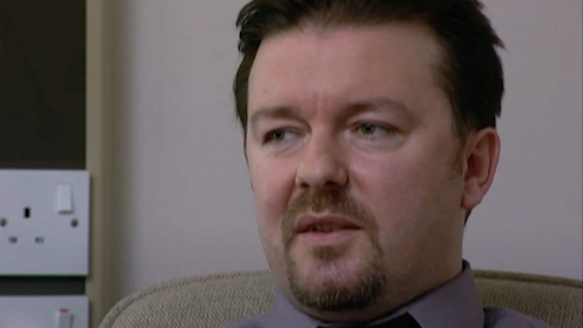 Writer and creator Ricky Gervais talks about playing David Brent (Image via YouTube/BBC Comedy Greats)